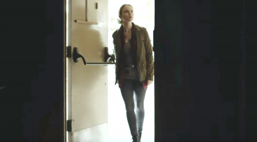 Gabby (Breanna Baker) walks into an abandoned building.'