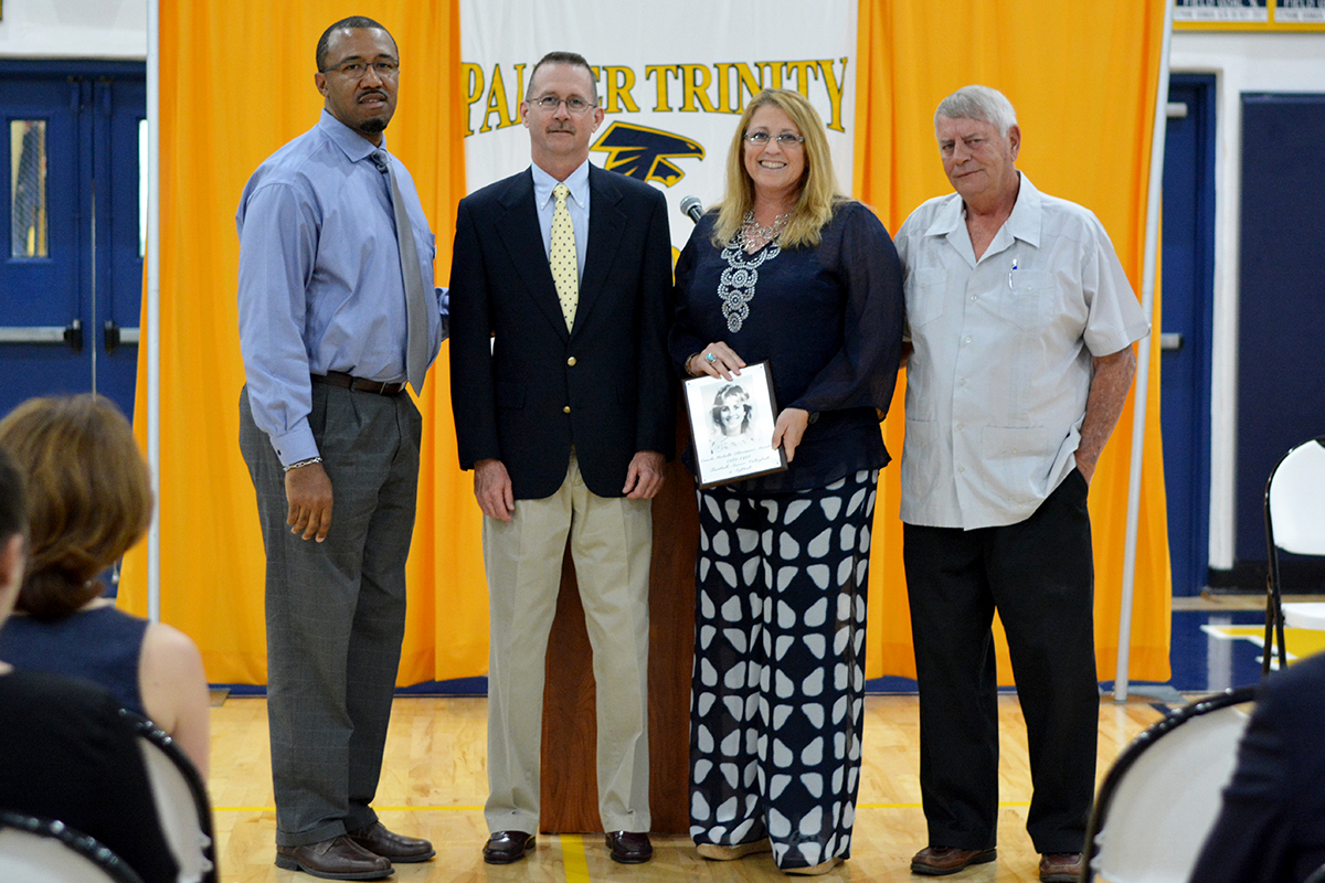 Ernest Robertson, Jr., director of athletics; Tom Magenheime