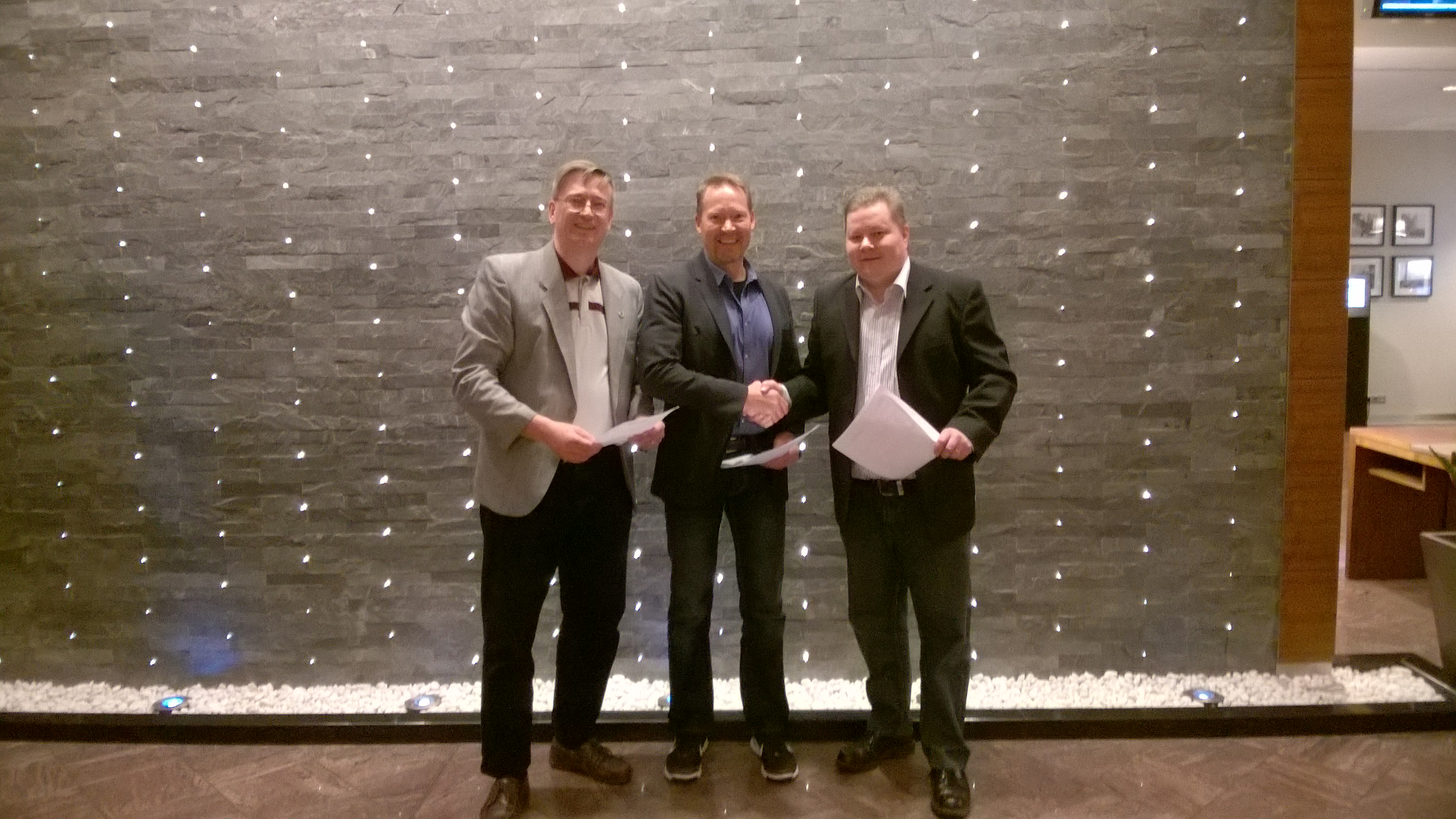 Sheldon and Visu Shake on Deal