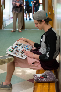 A Harbor High School student checks out his new yearbook.