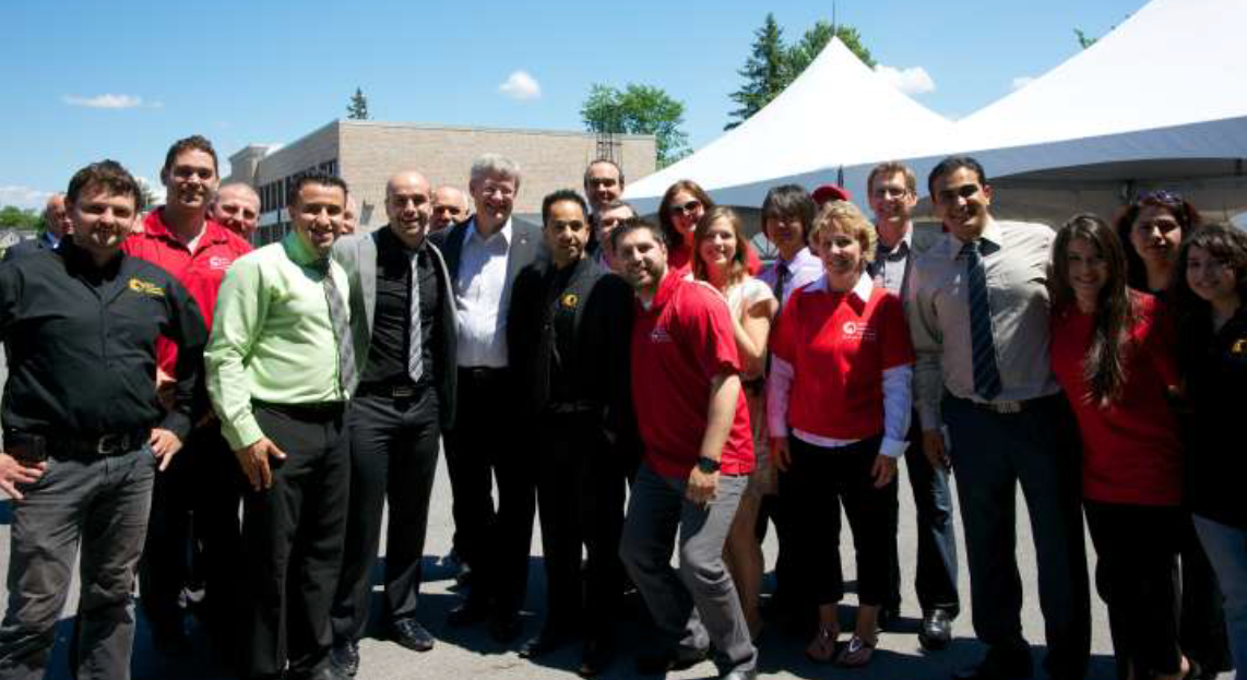 The whole team with Stephen Harper'