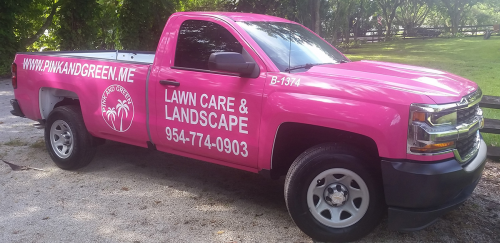 Pink and Green Lawn Care and Landscape's trucks.'
