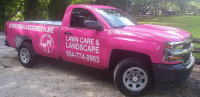 Pink and Green Lawn Care and Landscape's trucks.