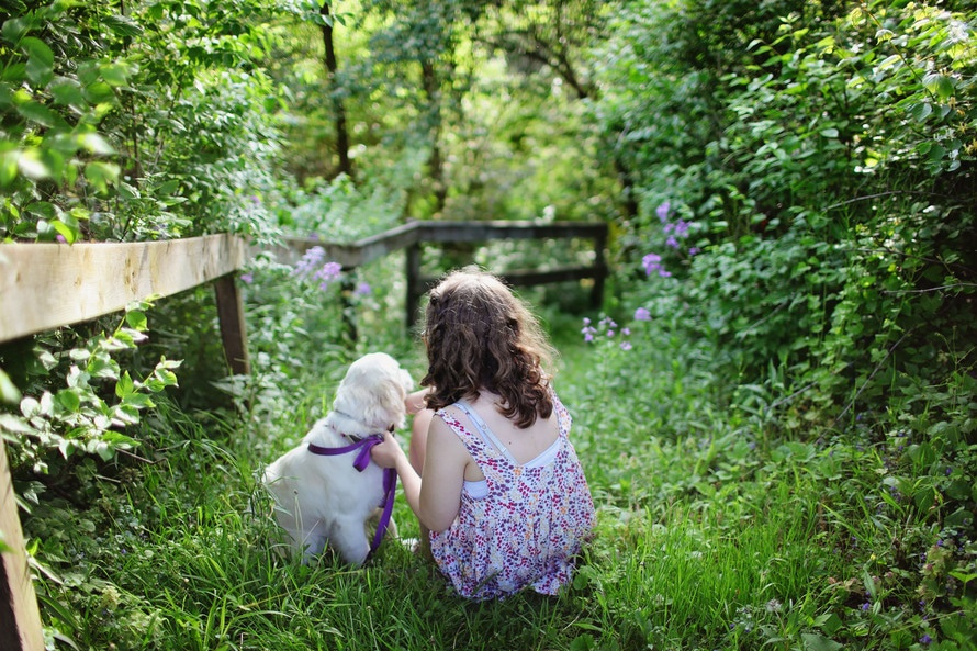 Girl and puppy'