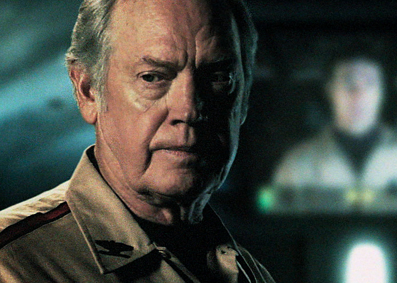 Ronny Cox in Cockpit'