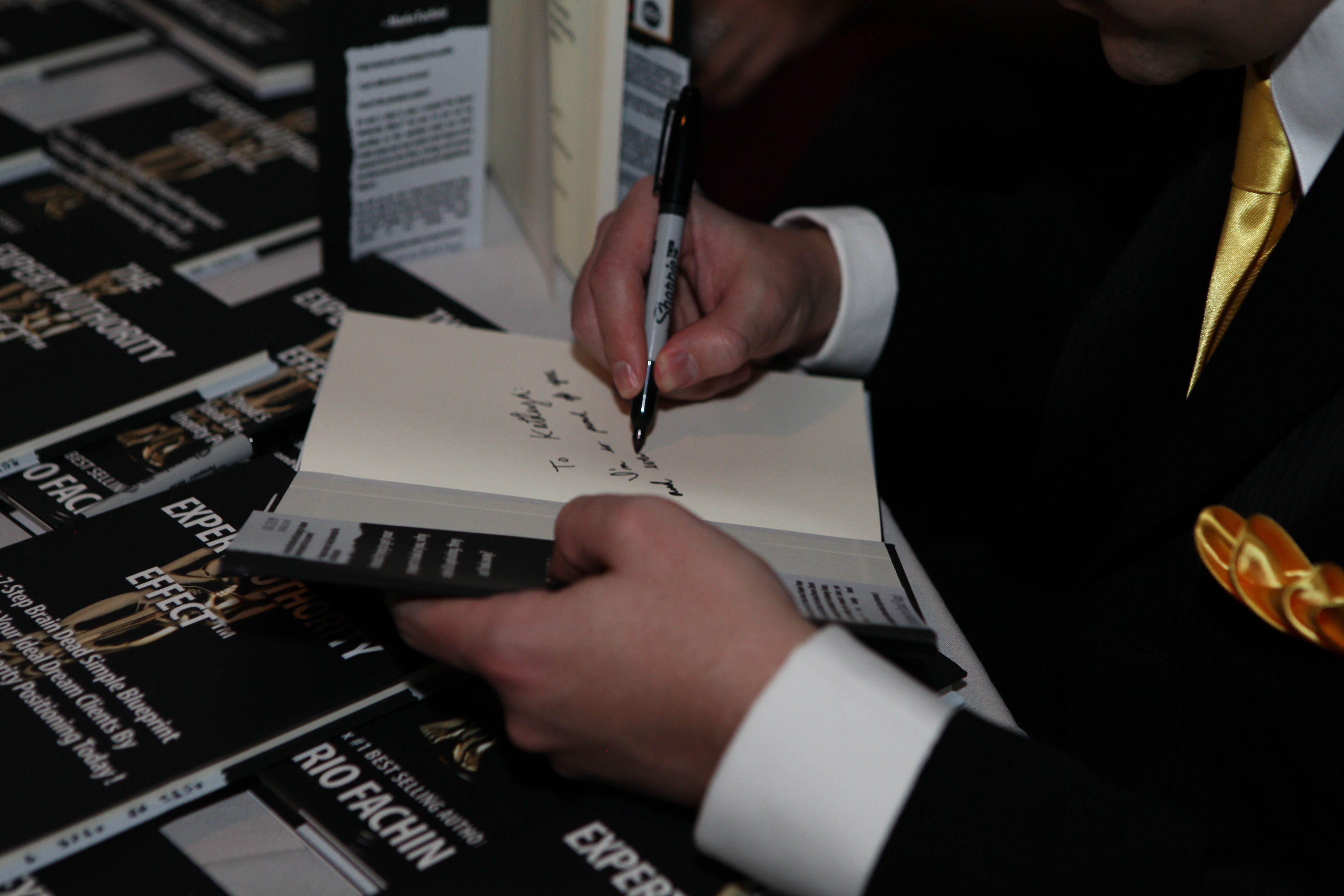 expert_authority_effect_autograph_close_up'