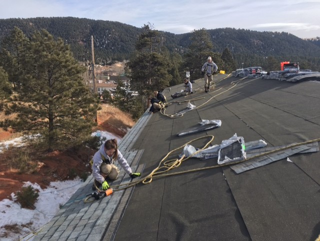 AmeriCorps NCCC do roofing work: Clock Tower Condos'