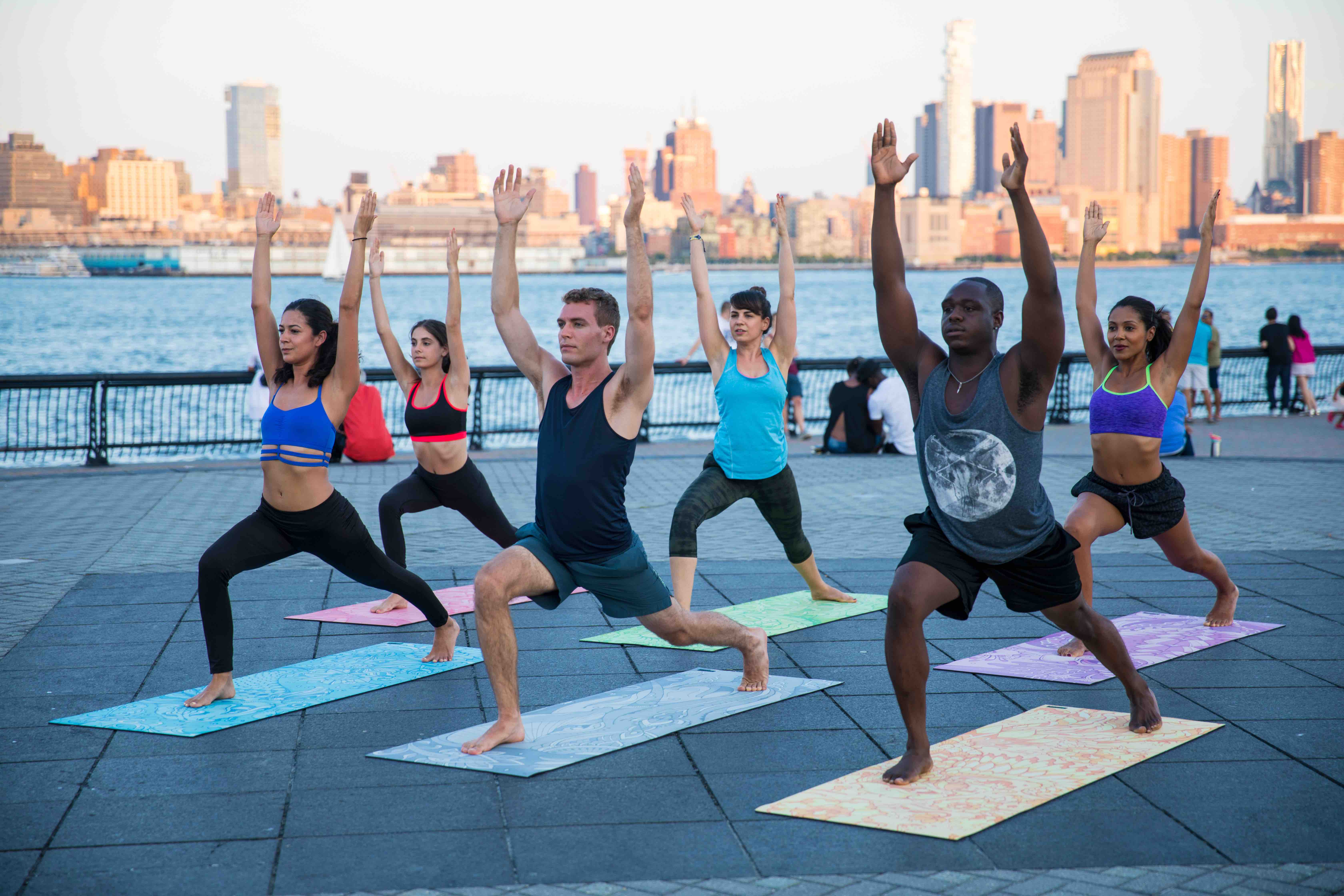 A group of yogis practicing on the beautiful Artletica yoga