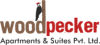 Company Logo For Woodpecker Apartments'