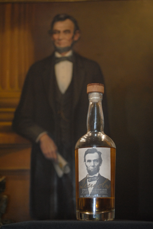 Lincoln bottle and portrait'