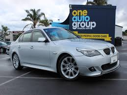 Company Logo For One Auto Group'