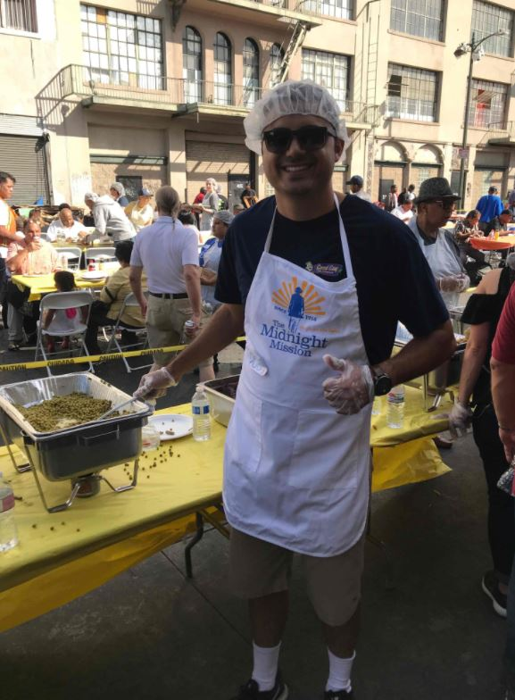 Robert Castelao, owner of Good Guy Plumbing, Serving Dinner
