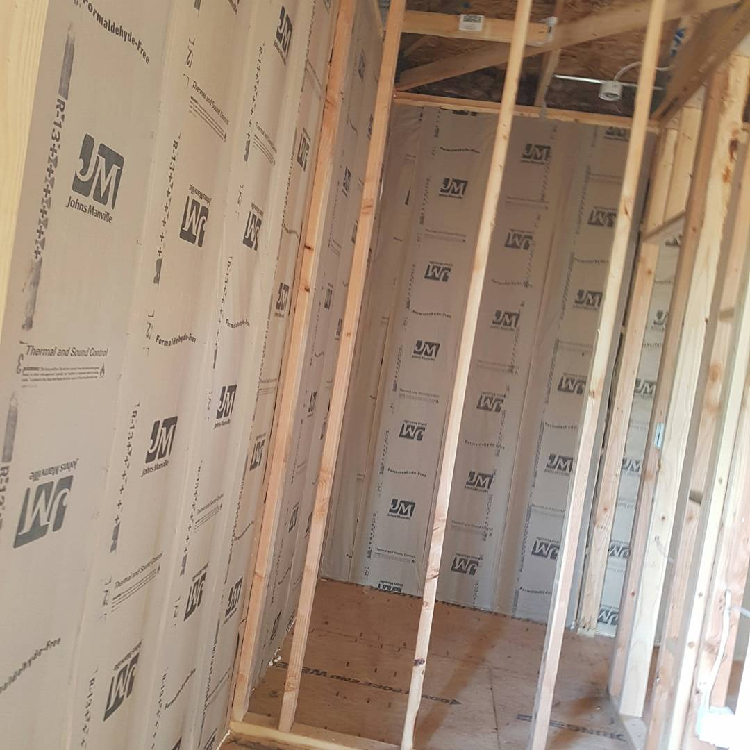 Fiberglass Batt Insulation in Walls of New Construction