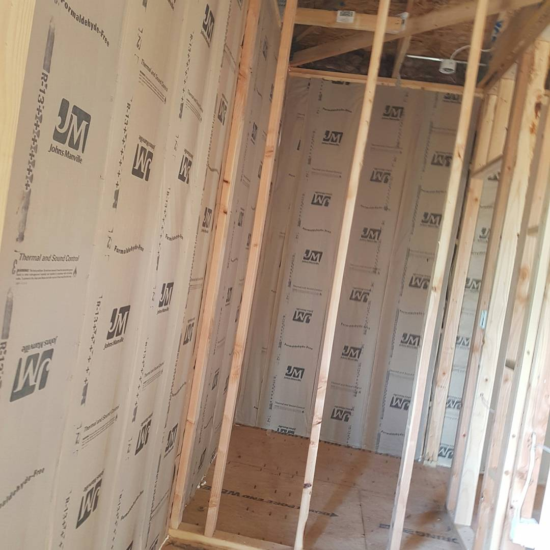 Fiberglass Batt Insulation in Walls of New Construction'