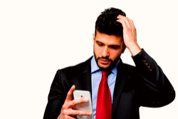 man looking at his smartphoen