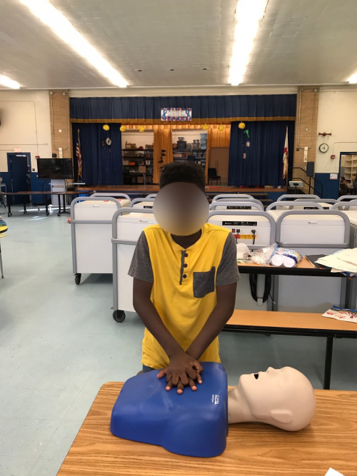 Pre-Teen Learns CPR during Disaster Preparedness Training'