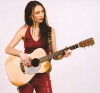 Kimberlee M. Leber in Red with Guitar'