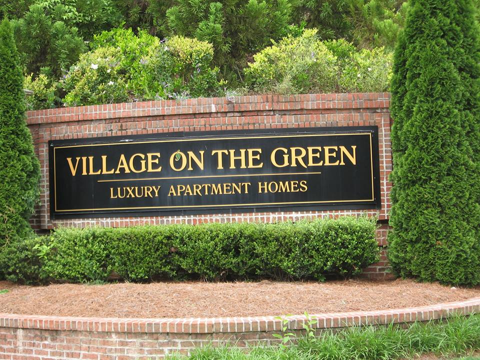Company Logo For Village On The Green'