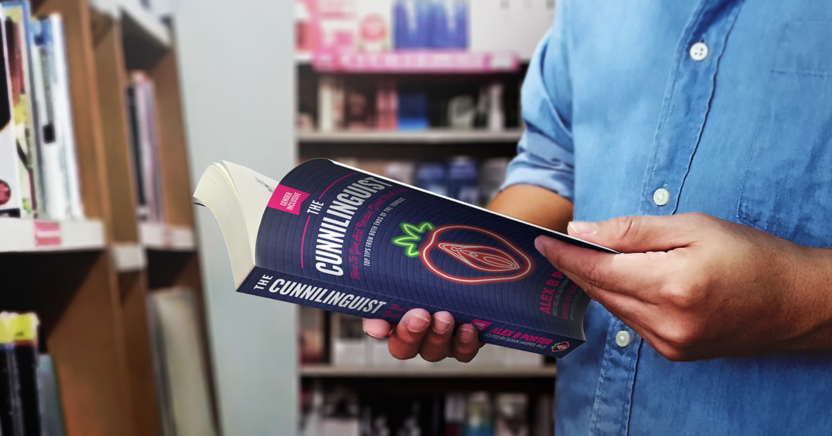Man holding The Cunnilinguist book'