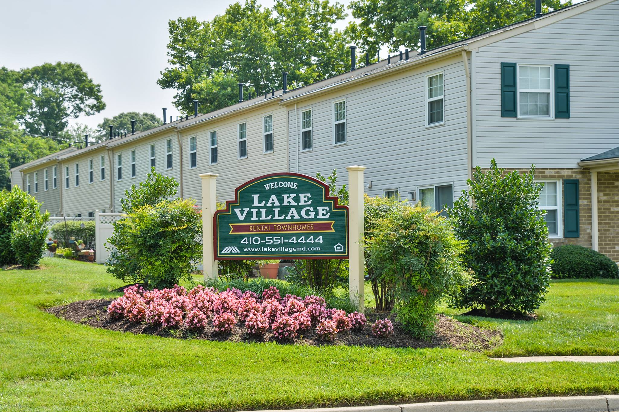 Company Logo For Lake Village Townhouses'