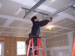 Company Logo For Garage Door Repair Experts Manvel'