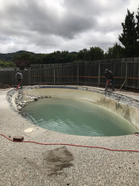 A pool demolition job in progress