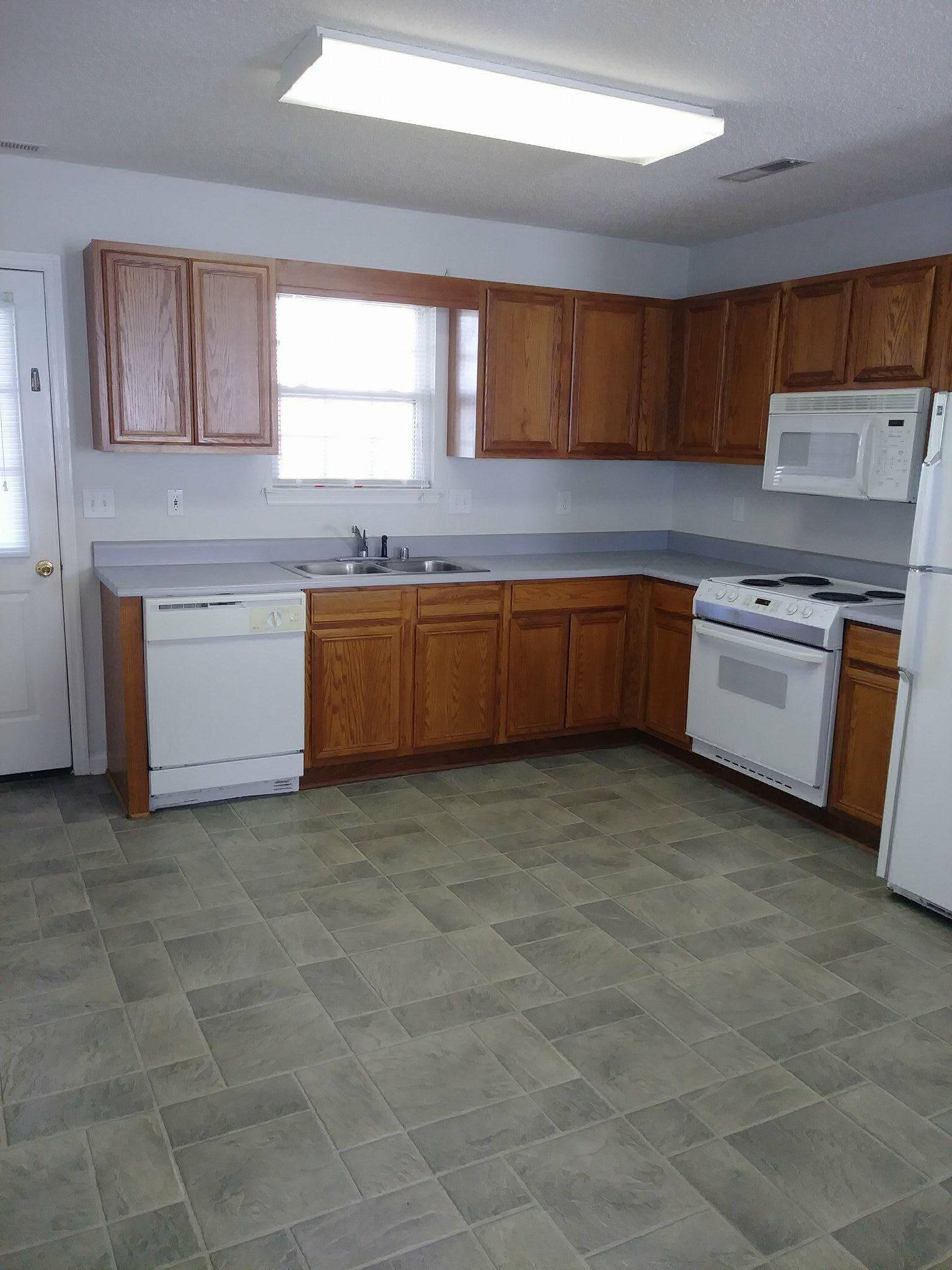 Company Photo For Huntington Place Townhomes'