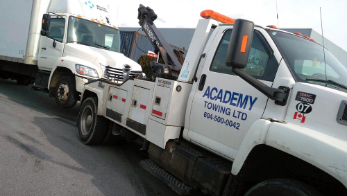 Company Logo For Academy Towing'