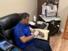 Raul Gutierrez prepares his at-home dialysis treatment'