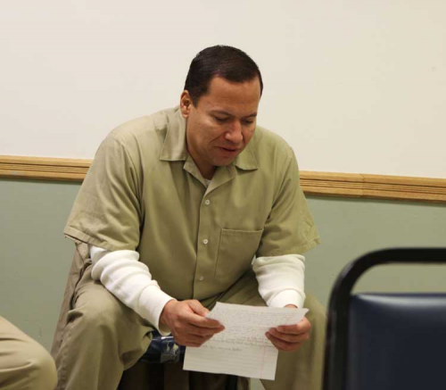 Inmate reading letter from penacon pen pal'