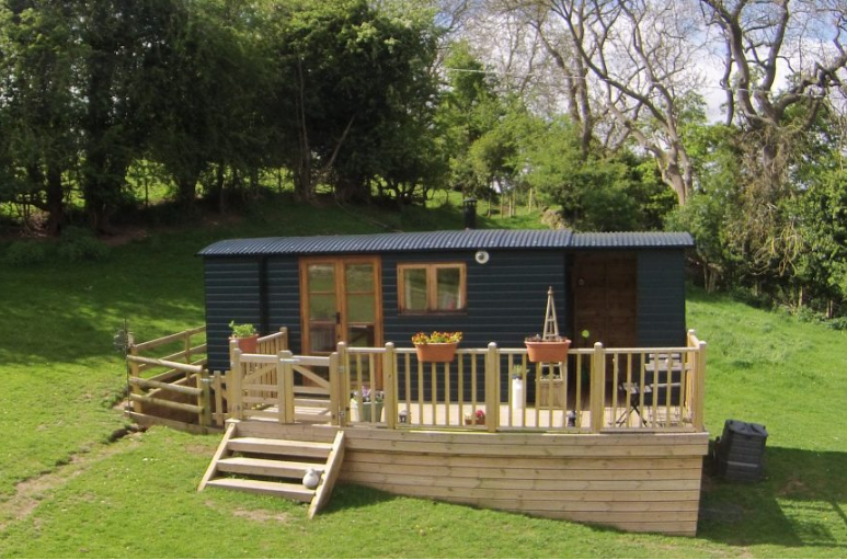 Company Logo For Beuno's Huts'