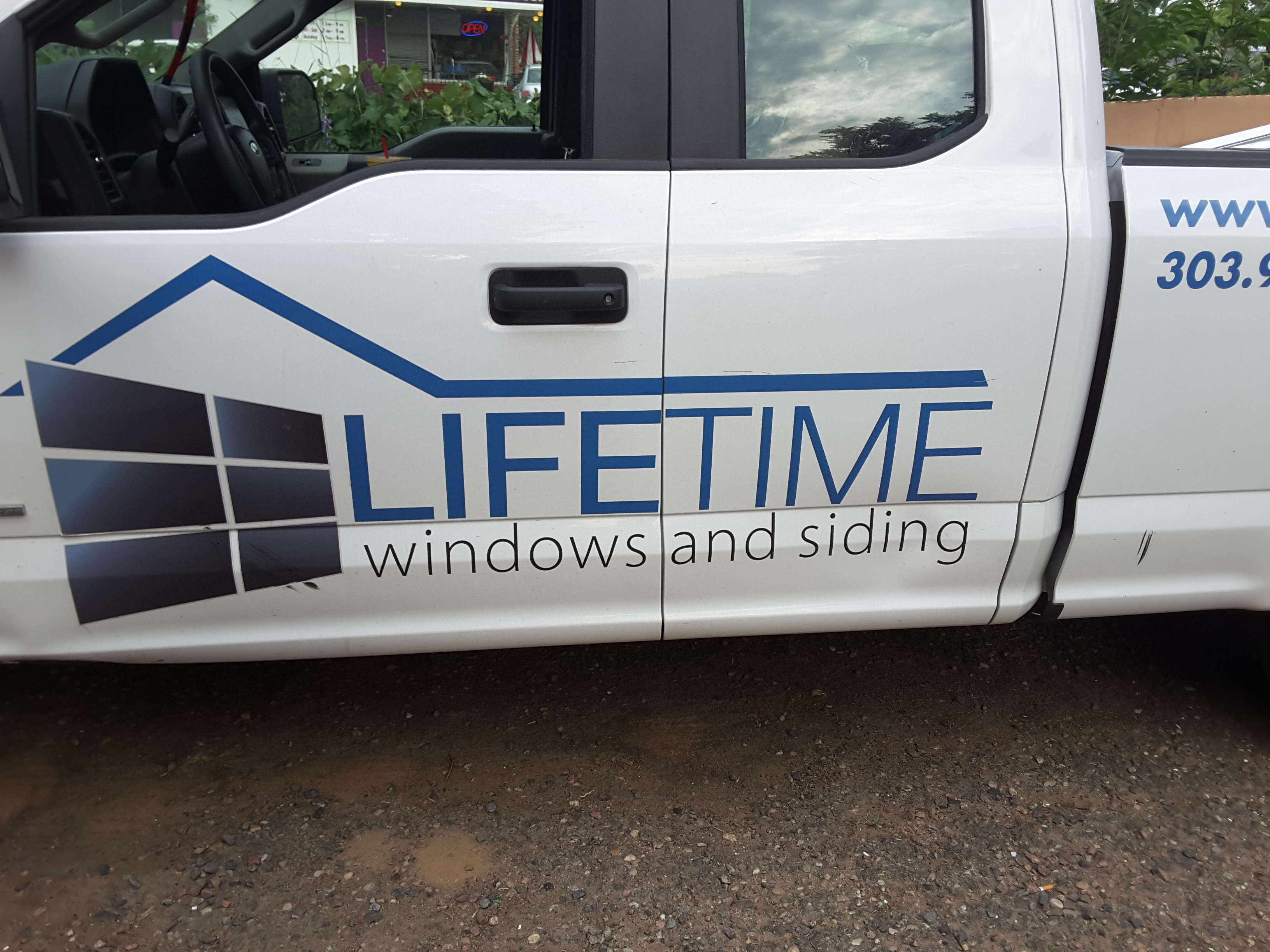 Company Logo For Lifetime Windows and Doors'