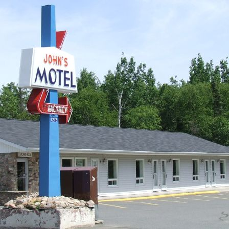 Company Logo For Johns Motel'