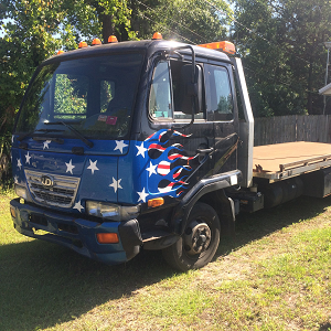 Mitchem Towing LLC Logo