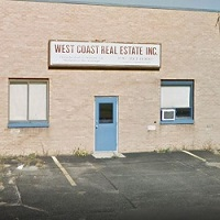 West Coast Real Estate Inc Logo