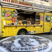 The Butt Hutt Smokehouse Logo