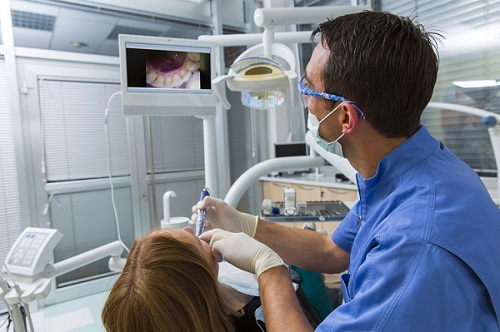 Company Logo For Highland Woods Dentistry'