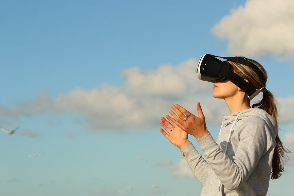 Woman using VR headset.