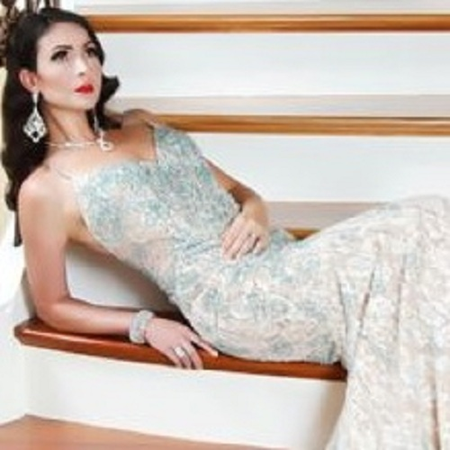 Company Logo For Dazzles Pageant and Prom Apparel'
