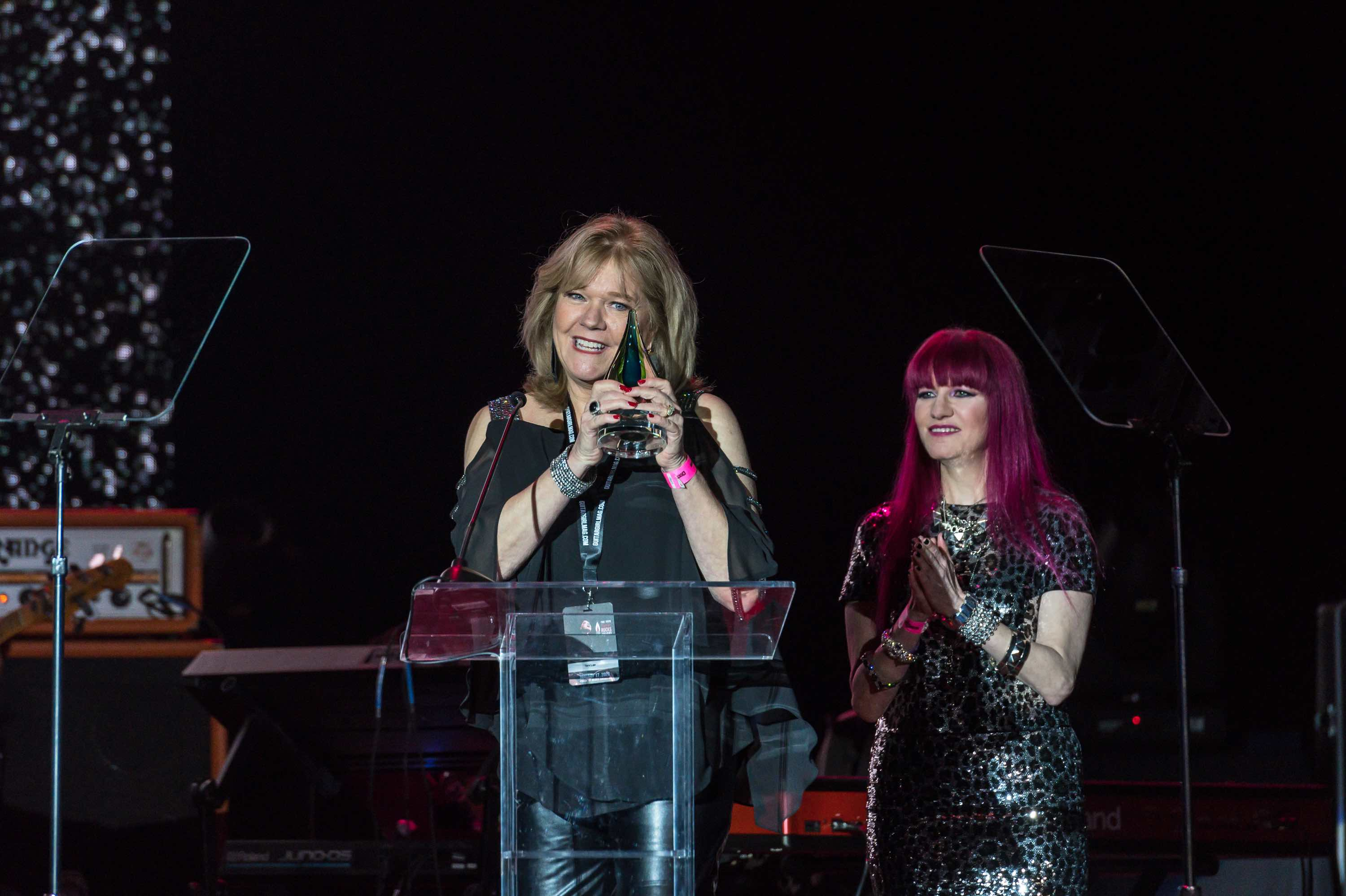 Tara Low receiving the Dreaming Out Loud Award.