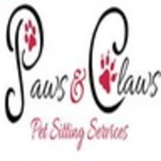 Company Logo For Paws &amp; Claws Services'