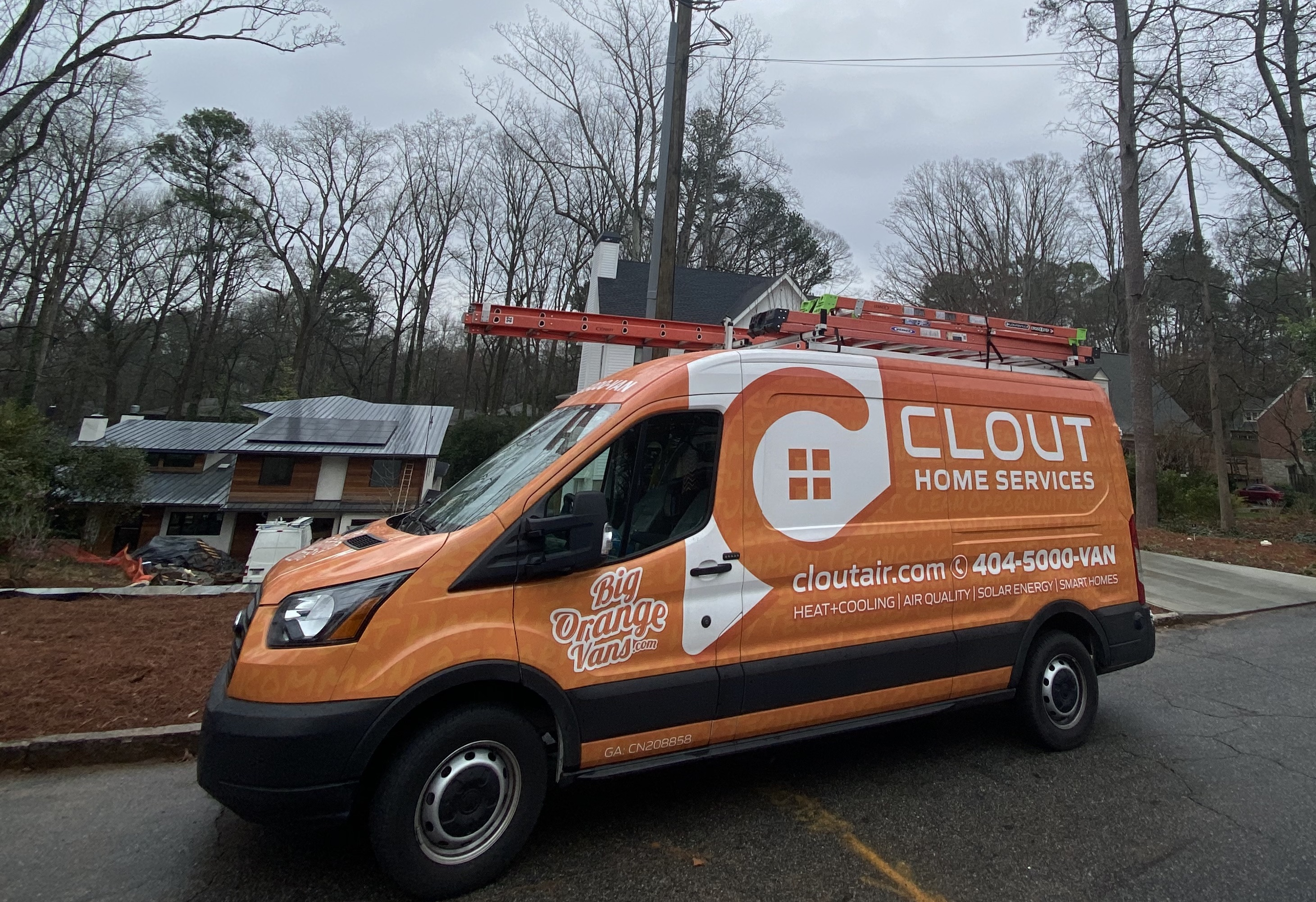 Clout's Iconic Big Orange Van at Customer's Home'