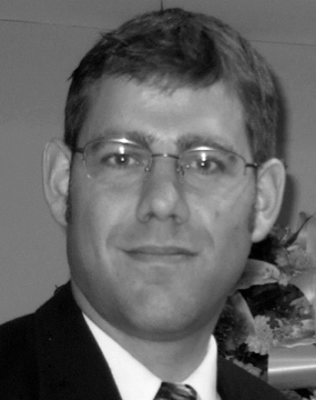 Dr Joel Lamoure, Director