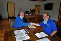 John Attaway Finalizes Donation with SCCi Chair Kris Green