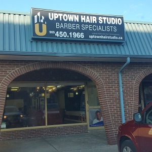 Company Logo For Uptown Hair Studio'