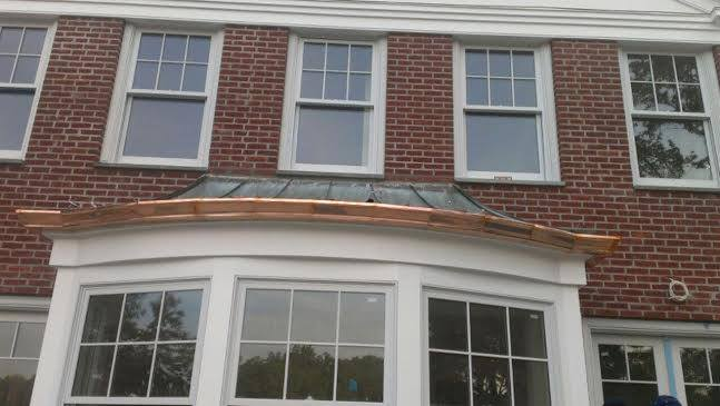 Company Logo For George's Seamless Gutters'