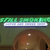 Still Smoking Vapor and Smoke Shop Logo