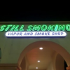 Company Logo For Still Smoking Vapor and Smoke Shop'