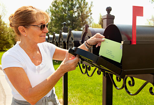 Female mailing letter to inmate pen pal'