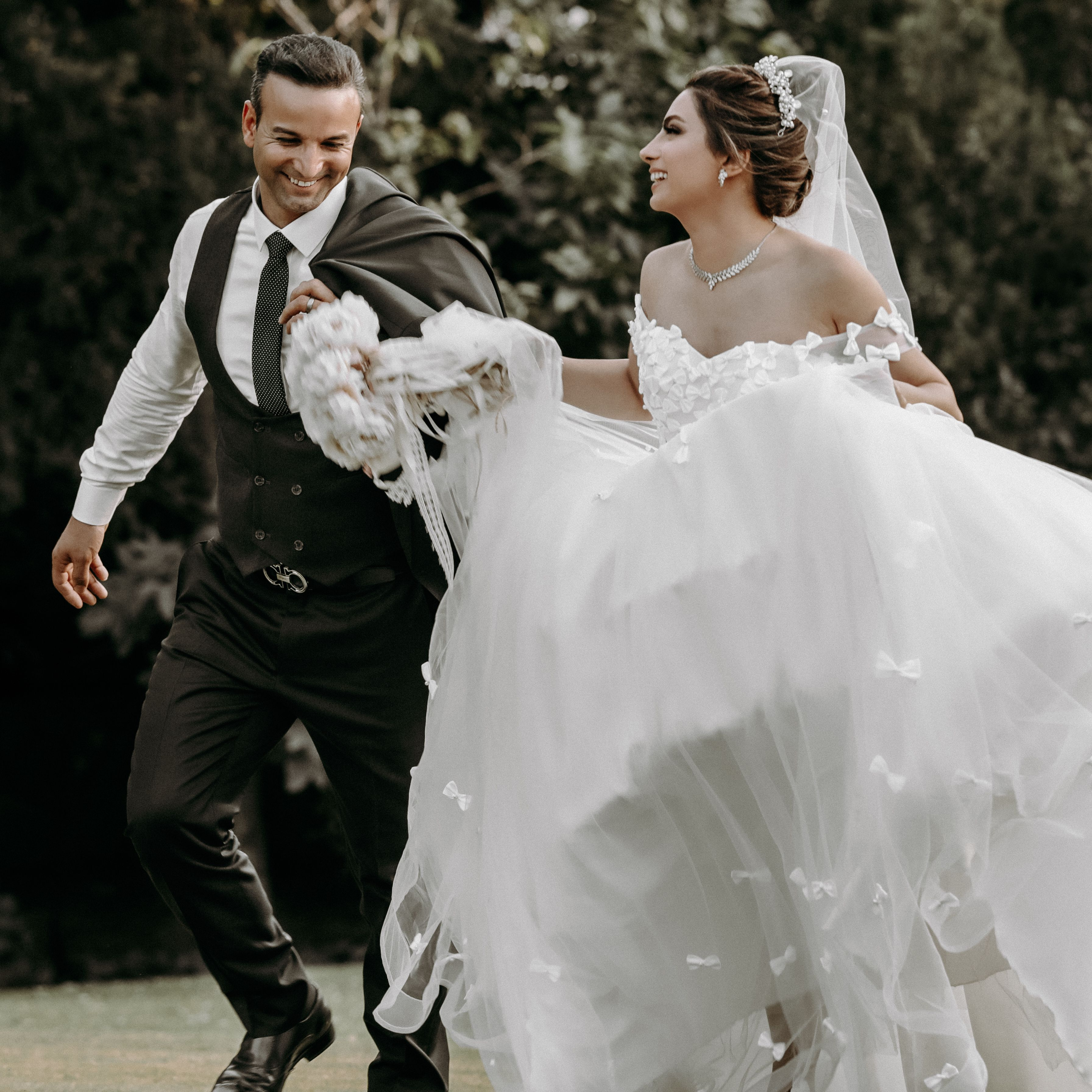 Company Logo For Brides and More Boutique'